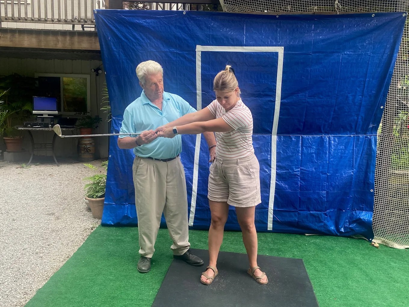 Golf instructor Ron Shea teaching the art of the swing in Cuyahoga Falls, Ohio 